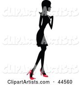 Silhouetted Woman in a Dress and Red Heels, Facing Right