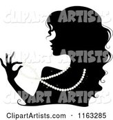 Silhouetted Woman Wearing a Pearl Necklace
