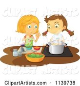 Two Girls Cooking a Meal Together