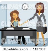 Two Women Shaking Hands While Meeting for a Job Interview