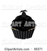 Vampire Bat and Tombstone on Top of a Black Cupcake