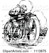 Vintage Black and White Man Racing a Motorcycle